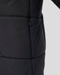 Close-up of navy Rangers FC junior padded training jacket showing a side zip pocket
