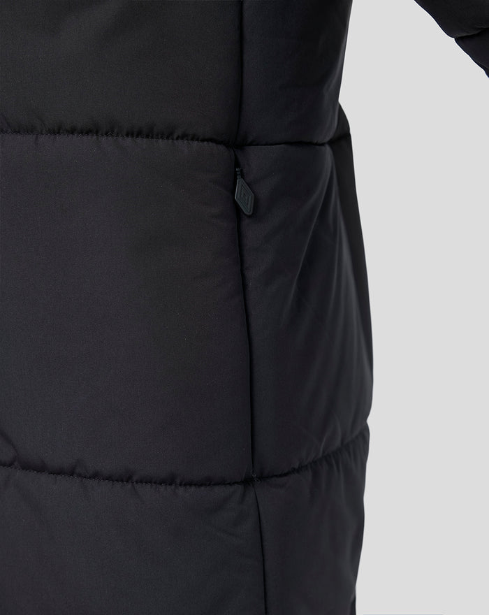 Close-up of navy Rangers FC junior padded training jacket showing a side zip pocket