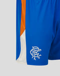Close up of blue shorts showing orange side stripe and white mesh vent panel along the leg.