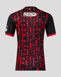 Back view of Rangers third shirt showing red geometric pattern on dark fabric and SEKO patch at upper back.