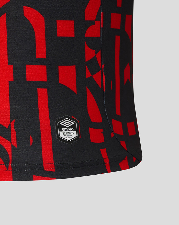 Close-up of Rangers third pro shirt fabric with red abstract pattern and Umbro official licensed product badge
