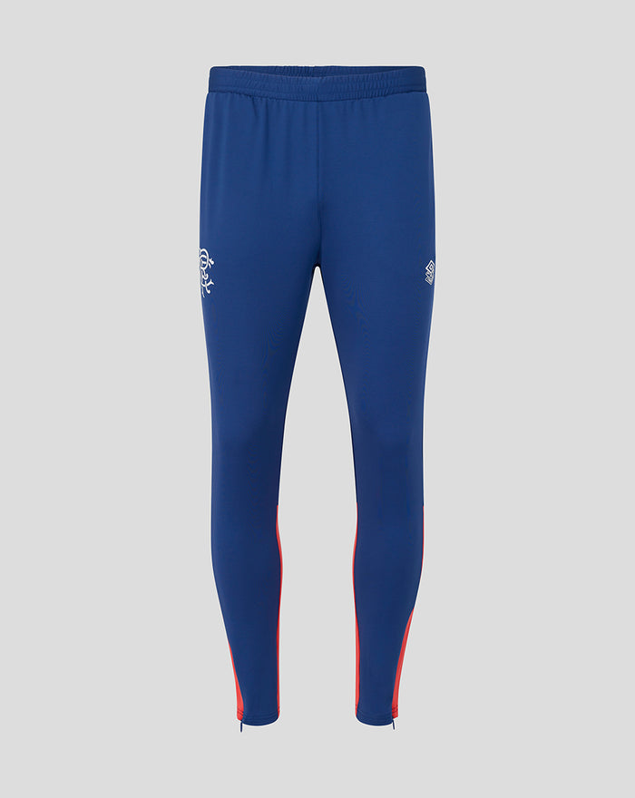 Rangers FC twilight blue training pants full length with white club crest on left thigh and small branding on the other hip, red piping along legs and zip cuffs