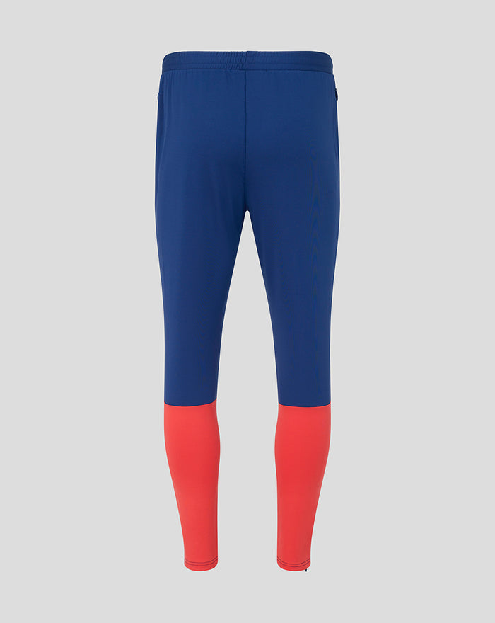 Back view of Rangers FC men's 2026/27 pro training pants in twilight blue with coral color blocking on the lower legs