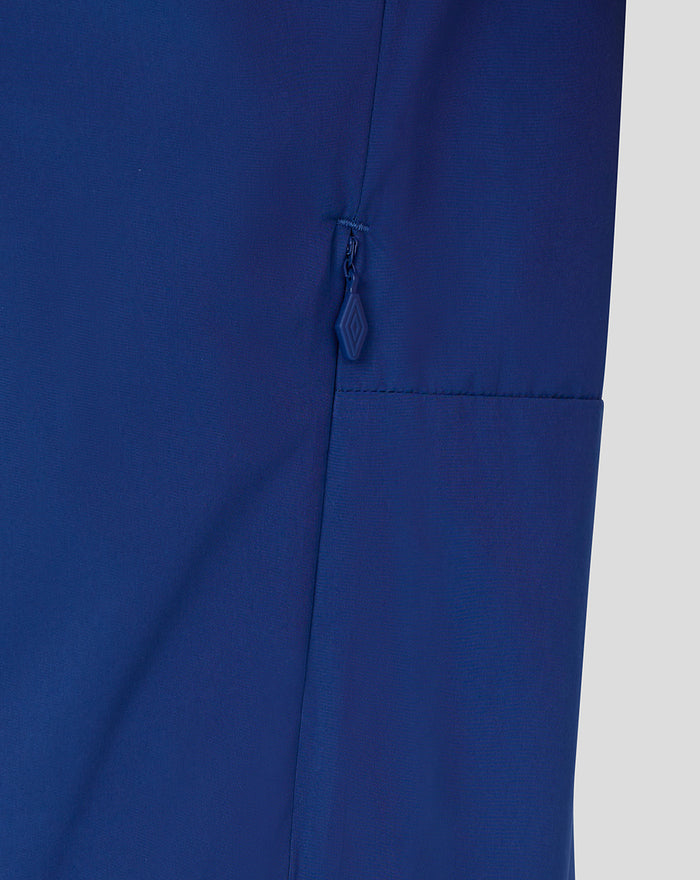 Close-up of side zip pocket on Twilight Blue Rangers training jacket with a blue zipper pull