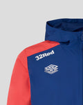 Close up of twilight blue Rangers training jacket showing 32Red sponsor and Umbro training logo on the chest area