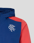 Rangers FC blue training jacket with a white crest on the chest and a red shoulder panel