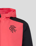 Upper chest close up of Calypso Coral Rangers FC training jacket with black sleeve and crest.