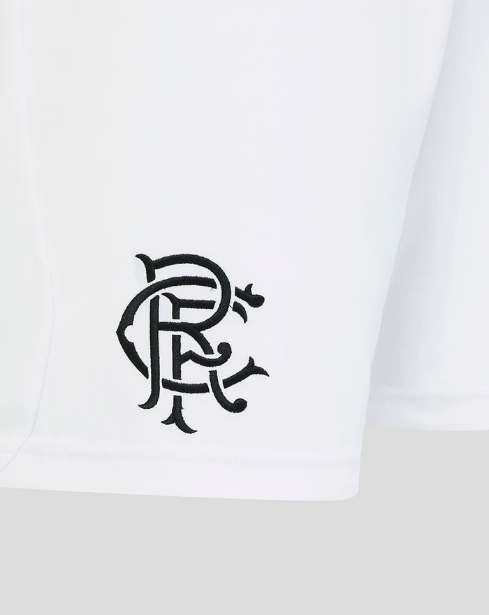 Close-up of white shorts showing the stitched Rangers crest near the hem
