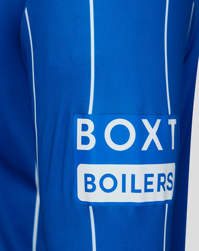 Close-up of royal blue Rangers home shirt fabric with white piping and a BOX BOILERS sponsor patch