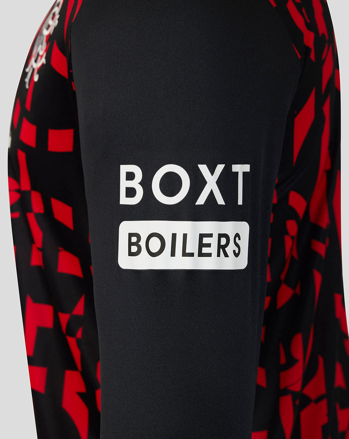 Close-up of Rangers mens third long sleeve shirt showing black fabric with red geometric pattern and partial Umbro logo