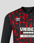 Close up of Rangers third pro long sleeve shirt displaying red geometric pattern, Umbro logo on the chest and UNIBET sponsor across the front.