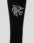 Close-up of Rangers black home sock showing white club crest embroidery