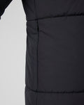 Close up of side seam with zipper pocket on navy padded Rangers FC training jacket