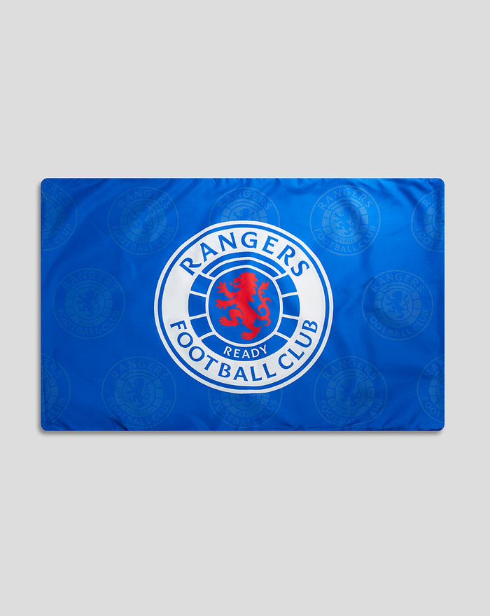 Blue duvet cover featuring Rangers FC crest laid flat with circular background pattern.