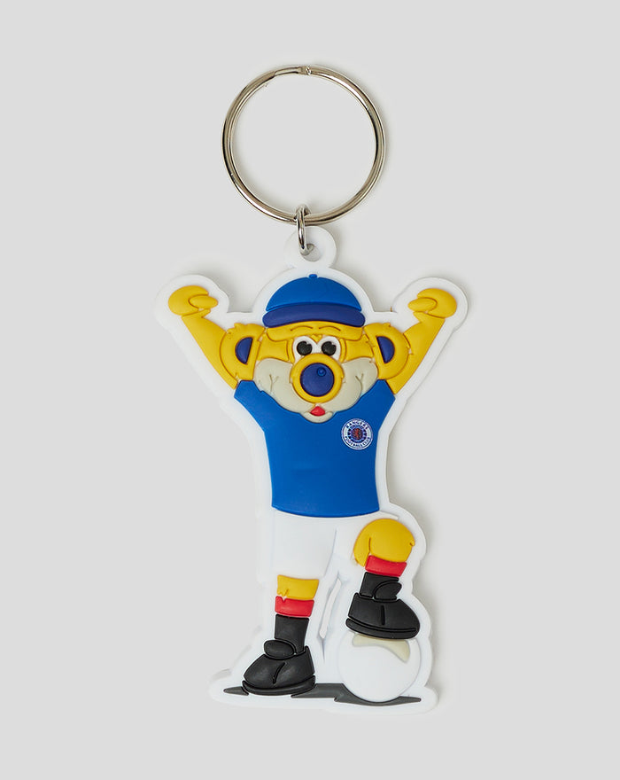 Broxi keyring cartoon mascot in blue shirt and cap with arms raised