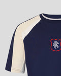 Close up of navy panelled tee showing contrasting cream shoulder panel and light sleeve panel.