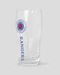 Clear pint glass with Rangers Football Club crest on the side and vertical RANGERS lettering