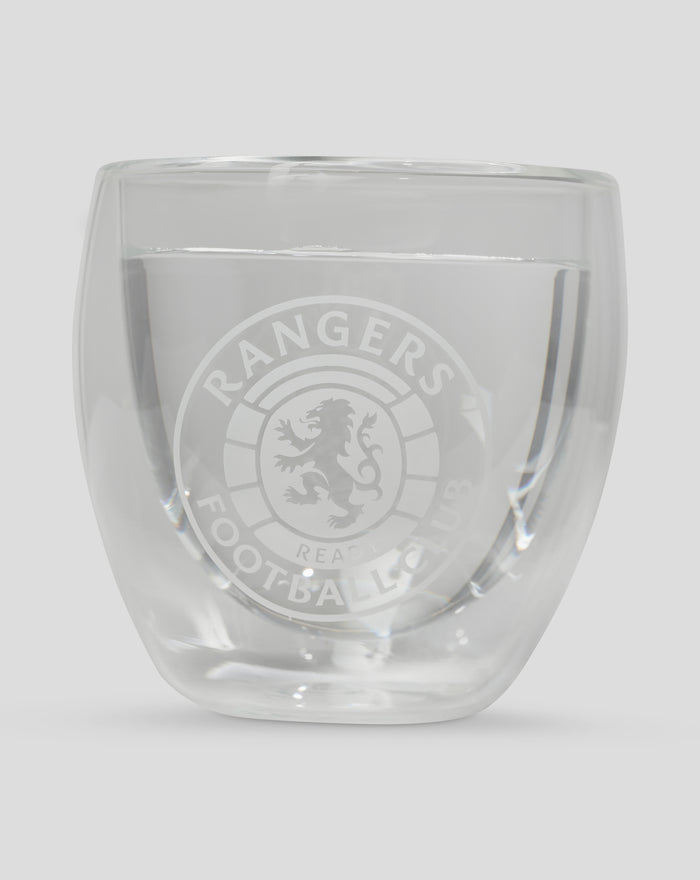 Close up of a clear double walled glass with the Rangers crest visible on the side