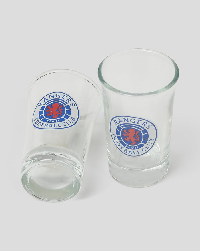 Two clear shot glasses with the Rangers Football Club crest on the front.