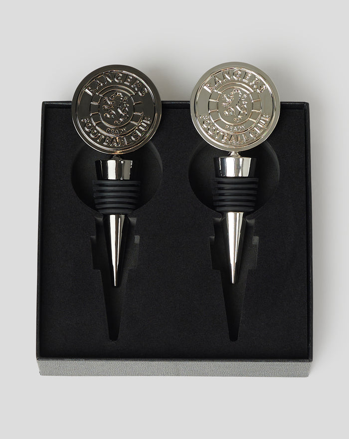 Two silver bottle stoppers with embossed Rangers crest in a black presentation box.