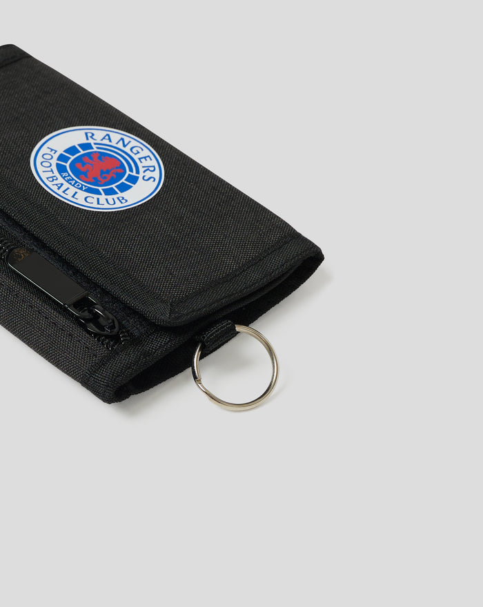 IN HOUSE RIPPER WALLET close up showing front zipper pocket and metal key ring