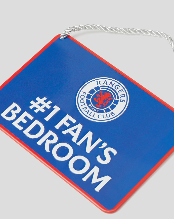 Angled shot of blue No 1 Fan Sign with Rangers crest and twisted rope hanger against a gray background
