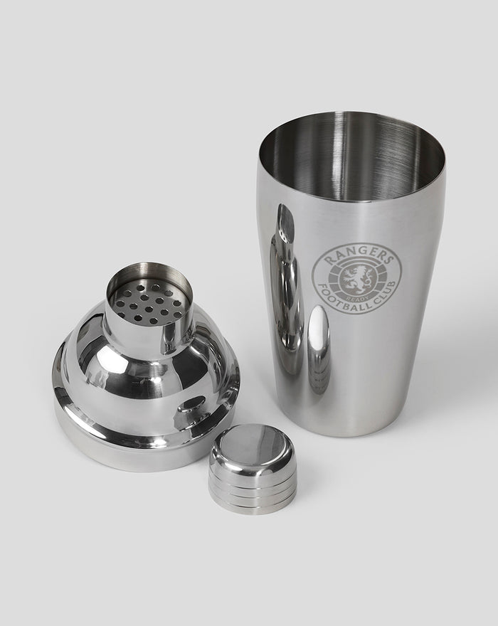 Stainless steel three piece cocktail shaker set with a perforated strainer and cap