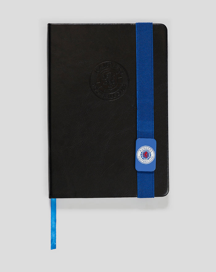 Black faux leather notebook with blue elastic band and crest badge closure