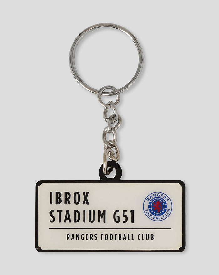 Rangers FC stadium keyring with white rectangular tag reading IBROX STADIUM G51 and Rangers club emblem