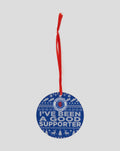 Blue knitted Christmas bauble with Rangers crest and Ive Been A Good Supporter text hanging from a red ribbon