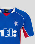 Close-up of chest area on blue Rangers 2001-02 home shirt showing crest and sponsor text.