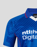 Close up of blue retro 2002-03 home shirt showing dotted pattern collar and red piping