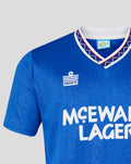 Close-up of the chest area showing the Admiral sponsor logo on a blue Rangers 1991-92 shirt with partial McEwan's Lager text