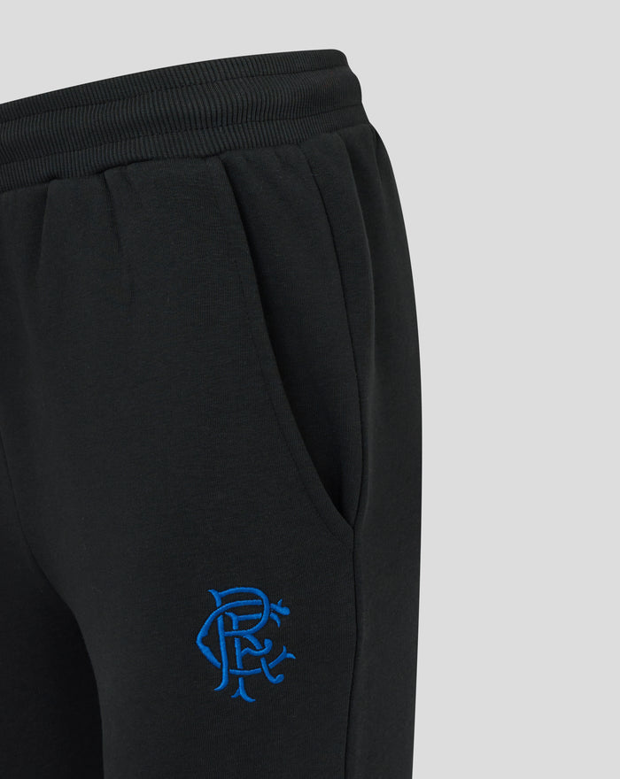 Close up of black Rangers women's jogger waistband with ribbed elastic and blue crest on the thigh