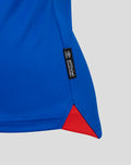 Close up of blue Rangers 25/26 women’s home shirt fabric with a black official licensed product tag along the side hem
