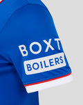 Detail of sleeve with BOX BOILERS sponsor patch on blue Rangers jersey.