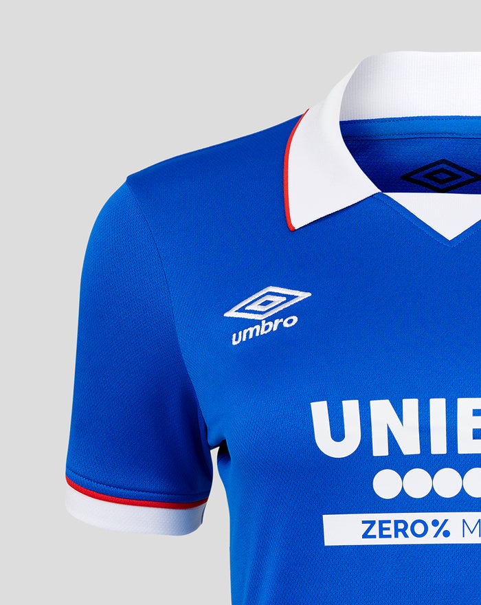 Front-quarter view of Rangers 25/26 Home shirt showing blue jersey with Umbro logo on right chest, crest on left, and UNIBET sponsor.