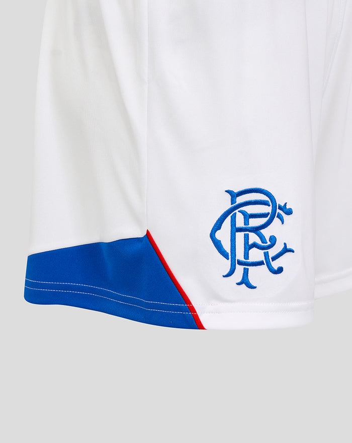 Rangers FC women's home shorts close up showing blue diagonal hem panel and club crest on white fabric