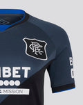 Close-up of navy Rangers jersey shoulder showing the club crest and Umbro logo.