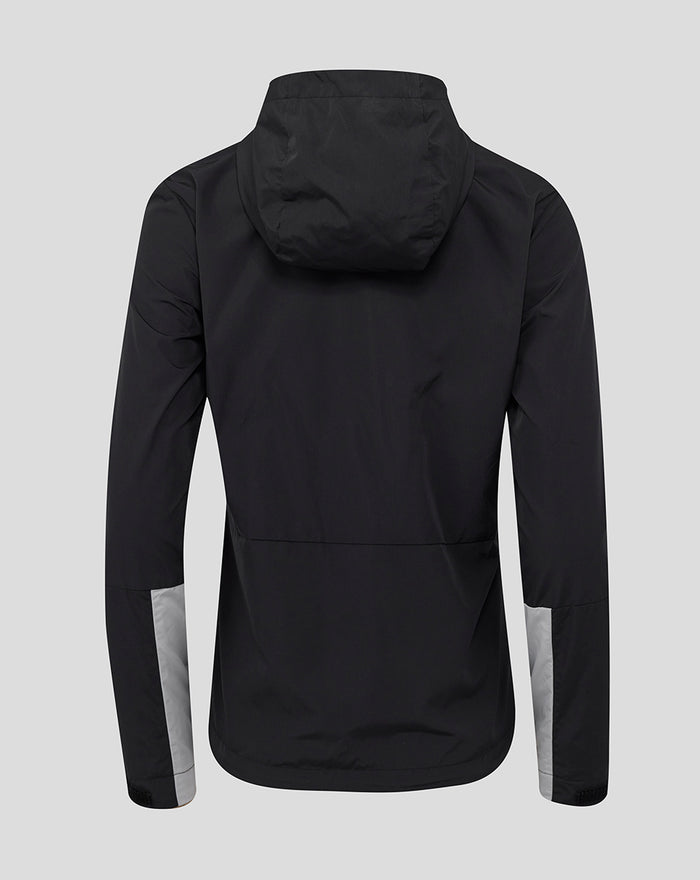 Back view of a black hooded training jacket showing the hood and light gray sleeve panels.
