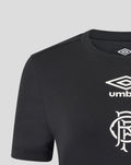 Shoulder and neckline close-up of black T shirt showing the Umbro diamond logo and club crest