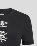 Upper chest close-up on black T shirt with Umbro diamond logo and large club crest print