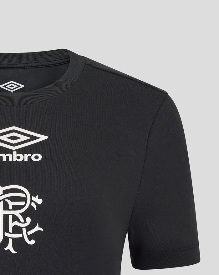 Upper chest close-up on black T shirt with Umbro diamond logo and large club crest print