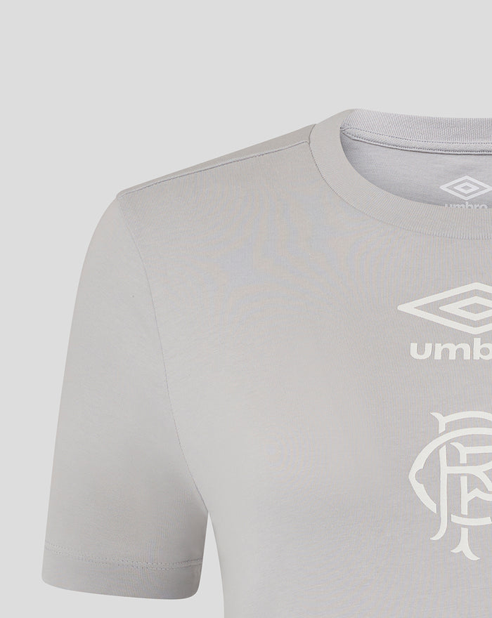 Close up of grey women's T shirt showing ribbed collar and white Umbro logo with club crest on the chest