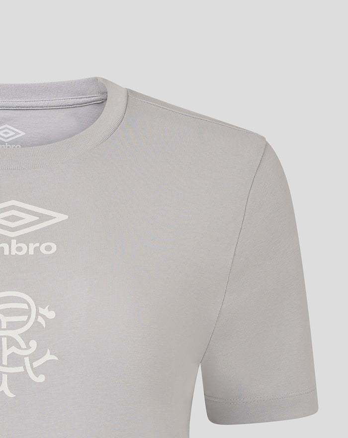 Detail of light grey women's T shirt showing white Umbro wings and club crest print on the chest