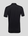 Back view of black womens poly polo showing short sleeves, a simple collar, and a curved hem