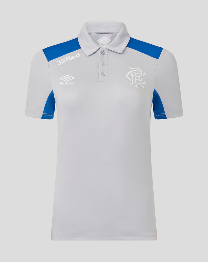 Front view of women's light gray poly polo with blue shoulder panels and Umbro crest on the chest.