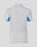 Back view of a light gray polo with blue sleeve inserts and neat hem lines
