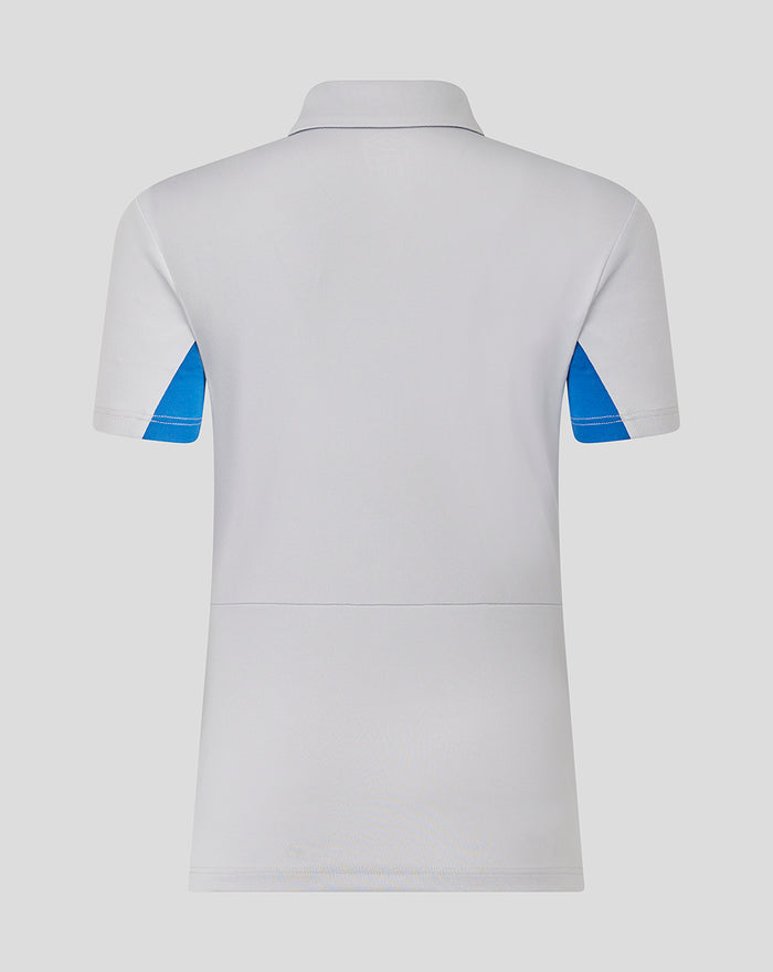 Back view of a light gray polo with blue sleeve inserts and neat hem lines