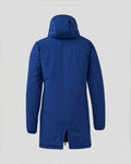 Rear view of a blue women's pro players bench jacket with hood